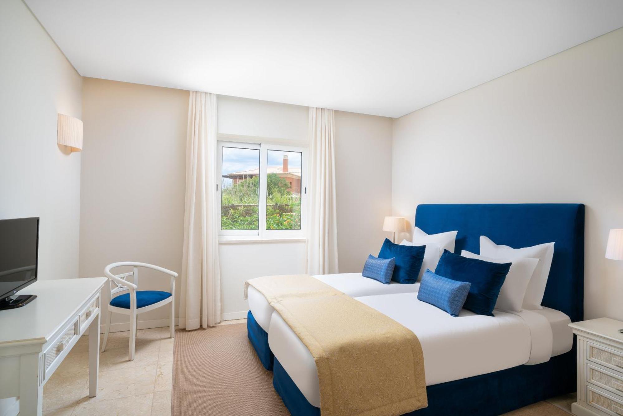 منتجع مونتي سانتو كارفويرو المظهر الخارجي الصورة A bedroom at the hotel